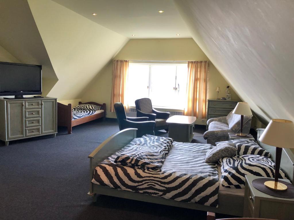 Postel nebo postele na pokoji v ubytování Willa Wicko - Międzyzdroje - apartamenty z aneksem - widok na Zalew Szczeciński