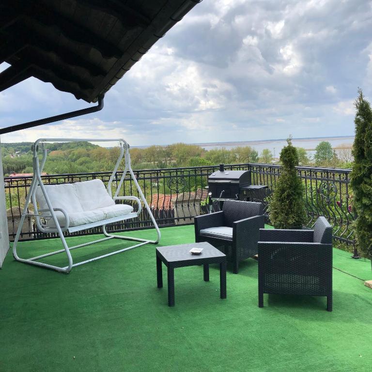 Balkón nebo terasa v ubytování Willa Wicko - Międzyzdroje - apartamenty z aneksem - widok na Zalew Szczeciński