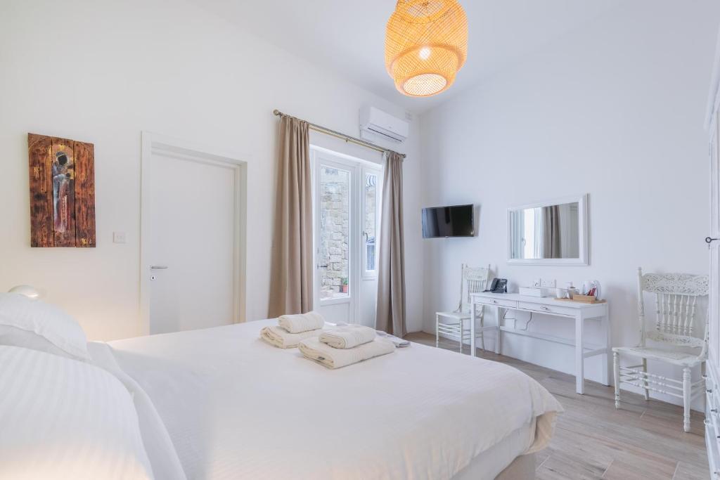 Postel nebo postele na pokoji v ubytování Mosta Dome B&B