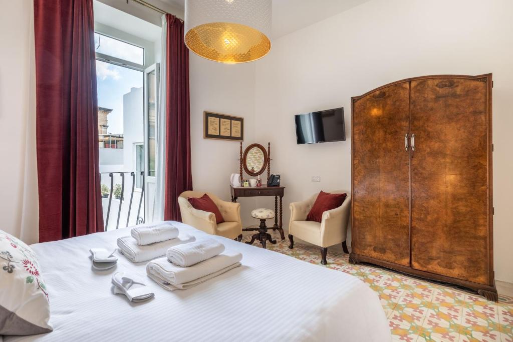 Postel nebo postele na pokoji v ubytování Mosta Dome B&B