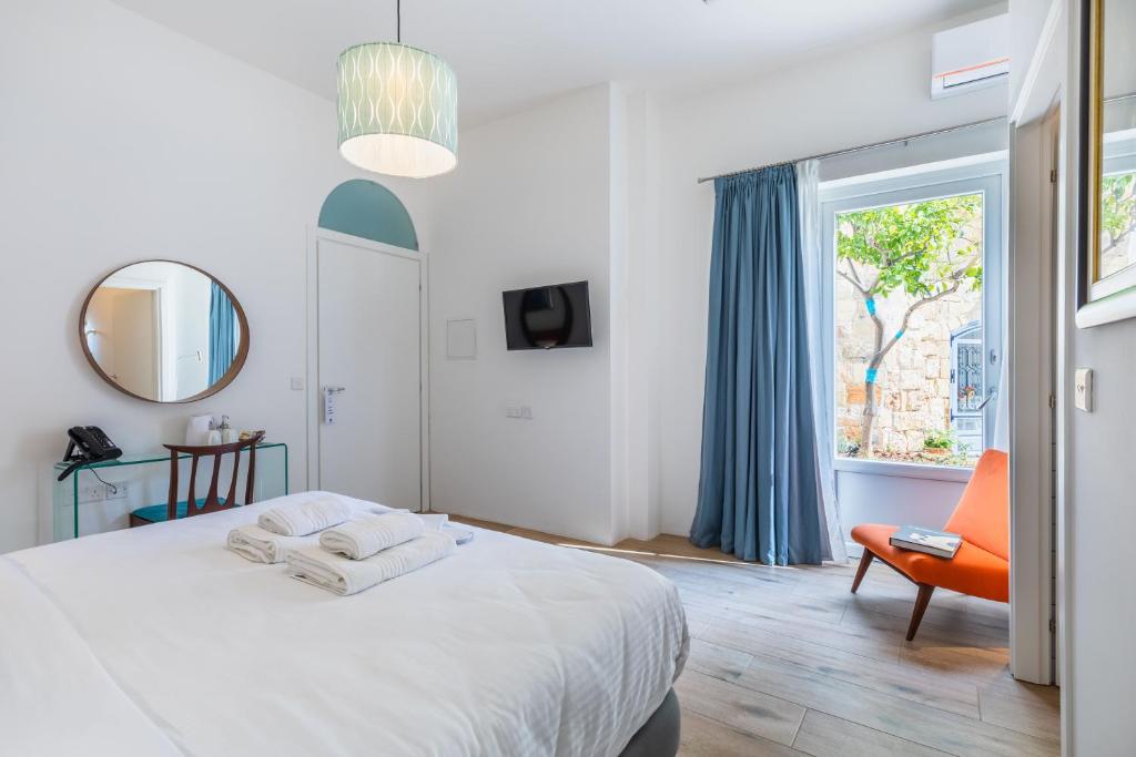 Postel nebo postele na pokoji v ubytování Mosta Dome B&B