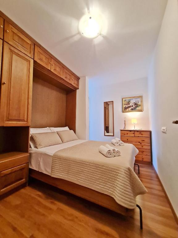 Postel nebo postele na pokoji v ubytování Apartment Nina Marie II