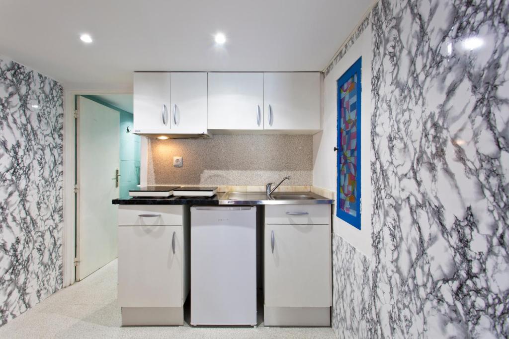 Kuchyň nebo kuchyňský kout v ubytování Oporto Blue Picaria - Unique Citycenter Apartment