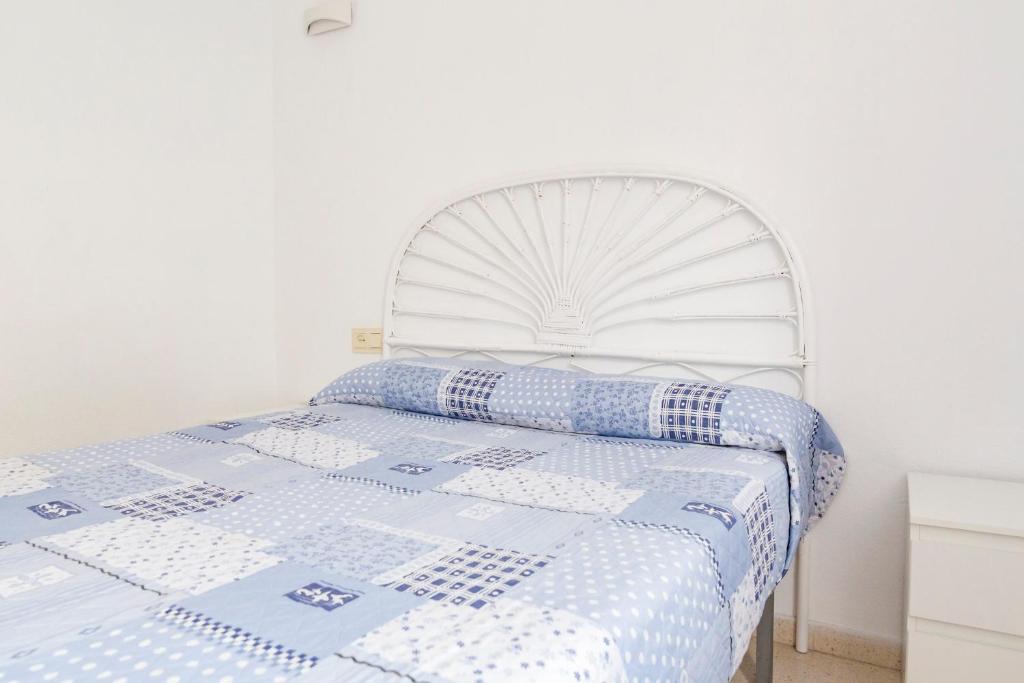 Posteľ alebo postele v izbe v ubytovaní Apartamento Málaga Agreda