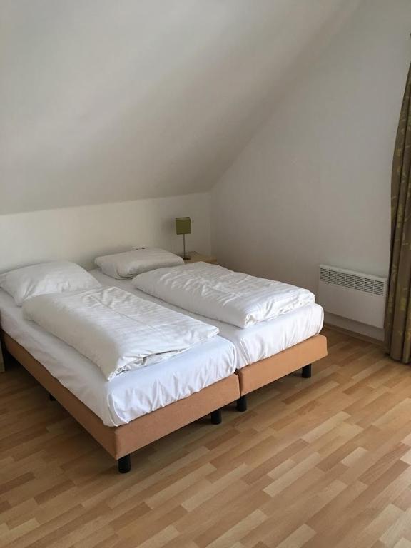 Postel nebo postele na pokoji v ubytování Villapark Lipno Dreams - pet friendly
