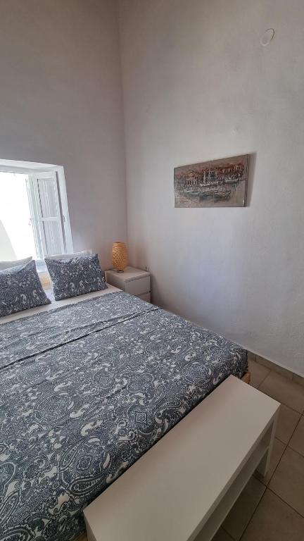 Posteľ alebo postele v izbe v ubytovaní Kozas Art House, Symi
