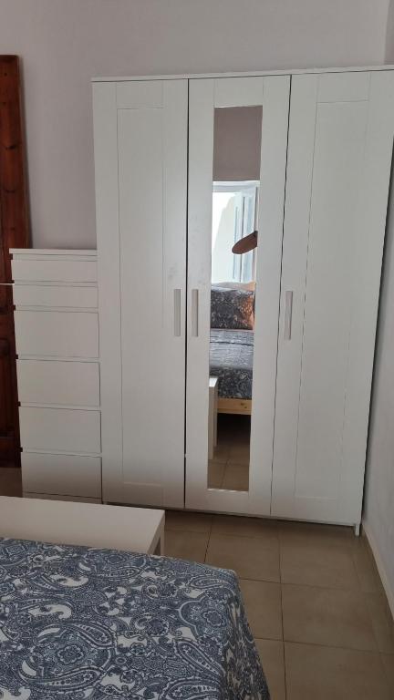 Posteľ alebo postele v izbe v ubytovaní Kozas Art House, Symi