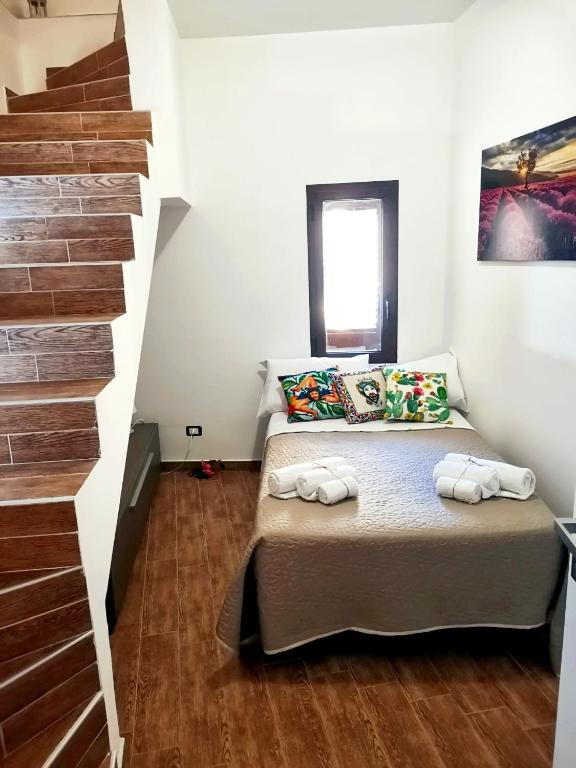 Postel nebo postele na pokoji v ubytování A due passi dal centro Sweet Rooms