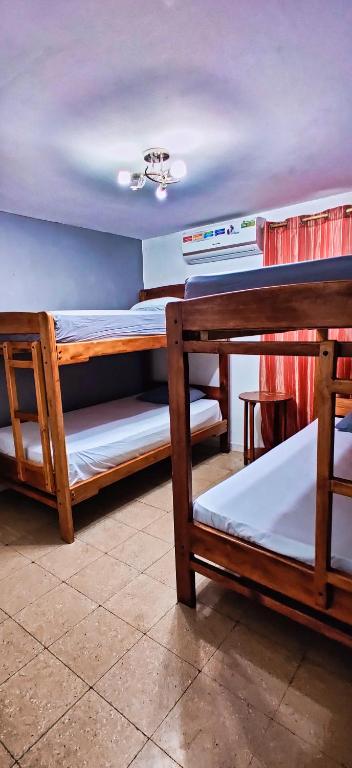 Postel nebo postele na pokoji v ubytování Casa Michael