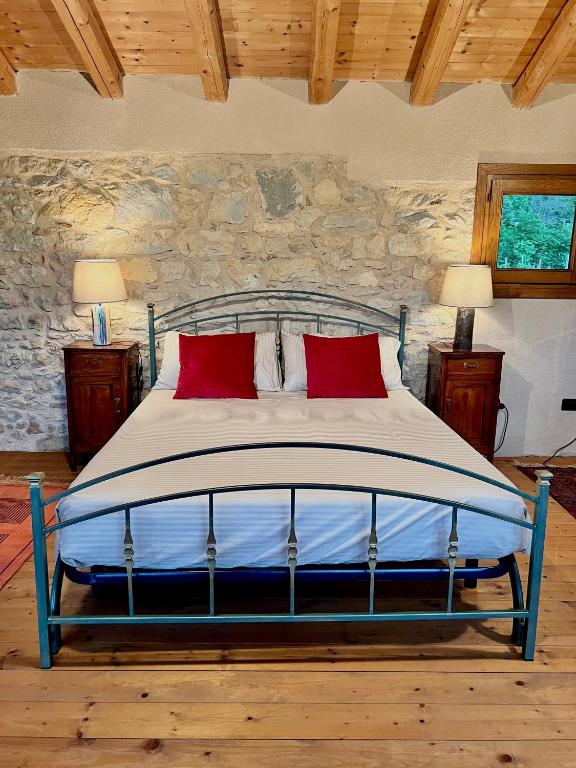 Postel nebo postele na pokoji v ubytování Agriturismo Il Conte Vassallo