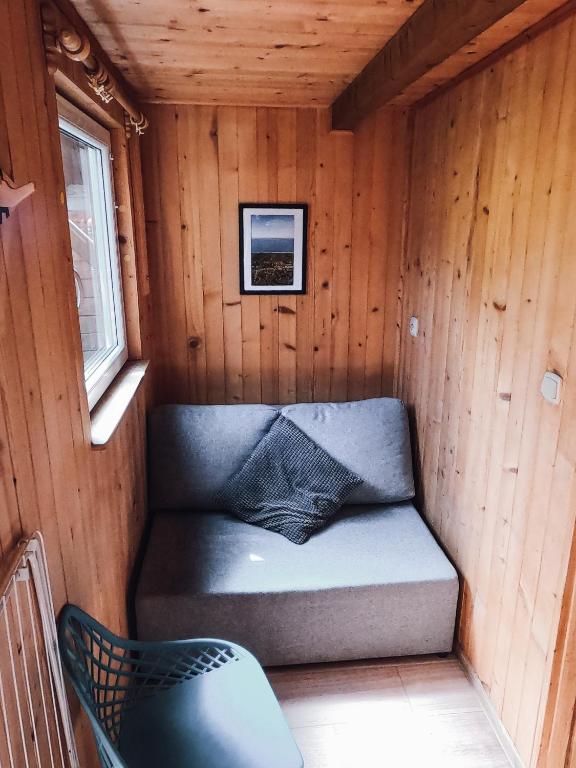 Istumisnurk majutusasutuses Pod Cyprysami - surf & family resort