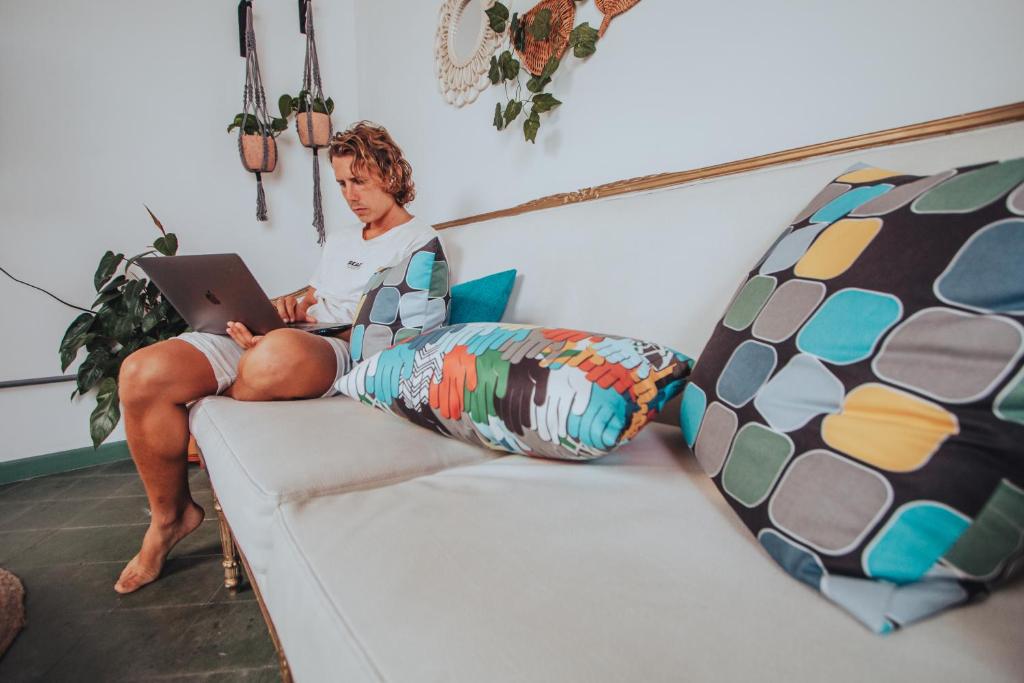 Postel nebo postele na pokoji v ubytování Centro Hostel Medellin