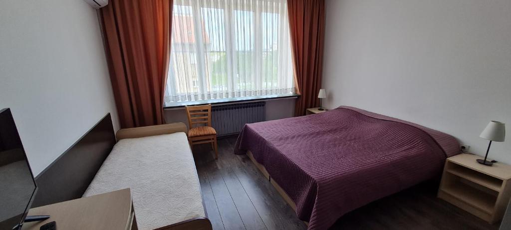 Postel nebo postele na pokoji v ubytování Rooms Lara