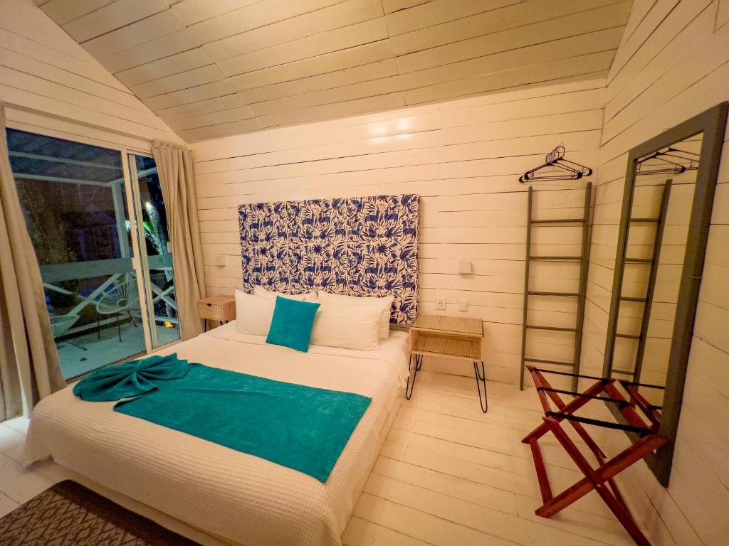 Postel nebo postele na pokoji v ubytování Zensus Eco Boutique Hotel