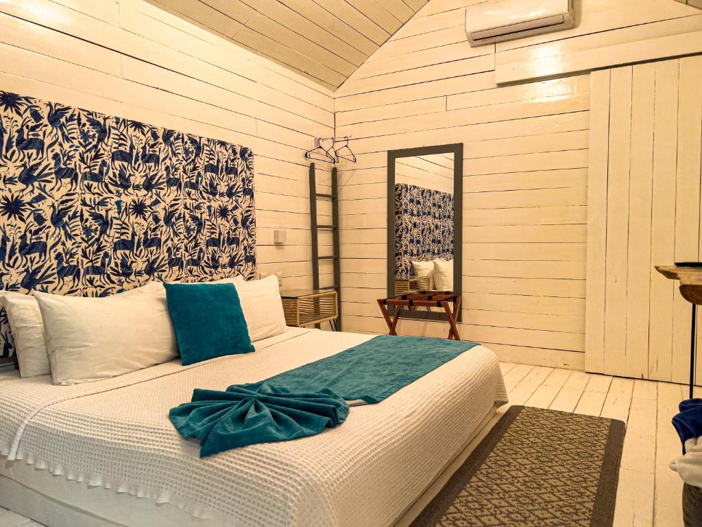 Postel nebo postele na pokoji v ubytování Zensus Eco Boutique Hotel