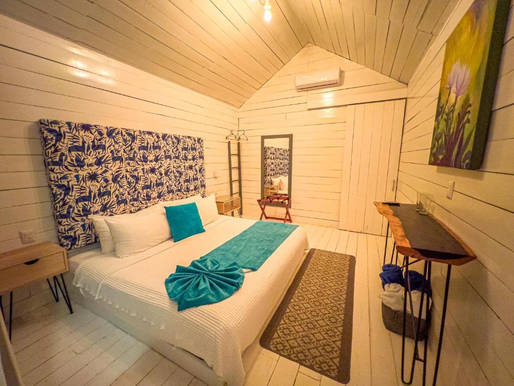Postel nebo postele na pokoji v ubytování Zensus Eco Boutique Hotel