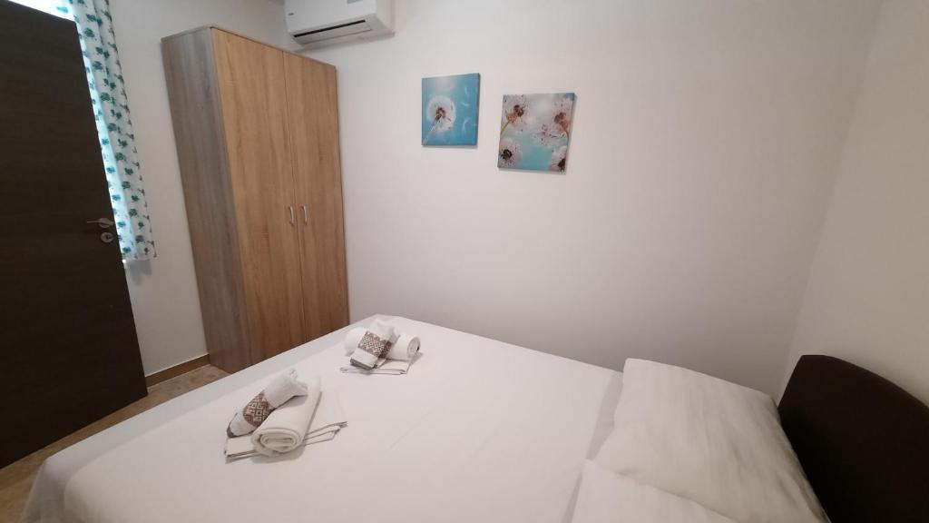 Postel nebo postele na pokoji v ubytování Apartment Tonci
