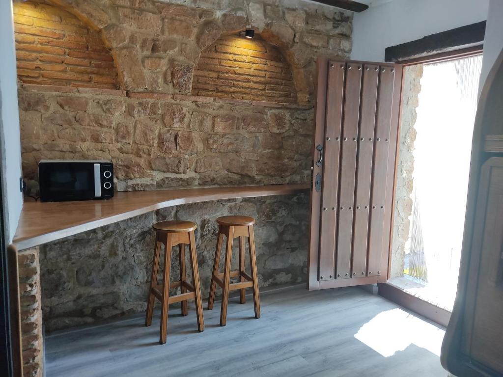 Kuchyň nebo kuchyňský kout v ubytování Hostal Suetxe