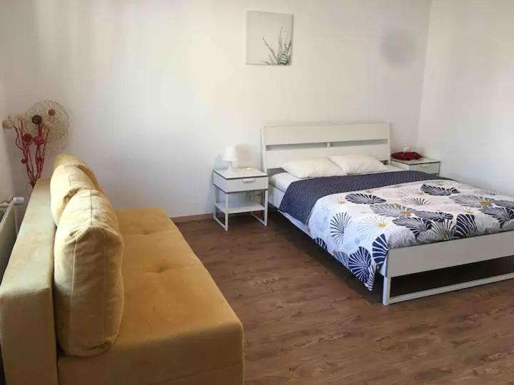 Postel nebo postele na pokoji v ubytování Apartment CHEZ TONY