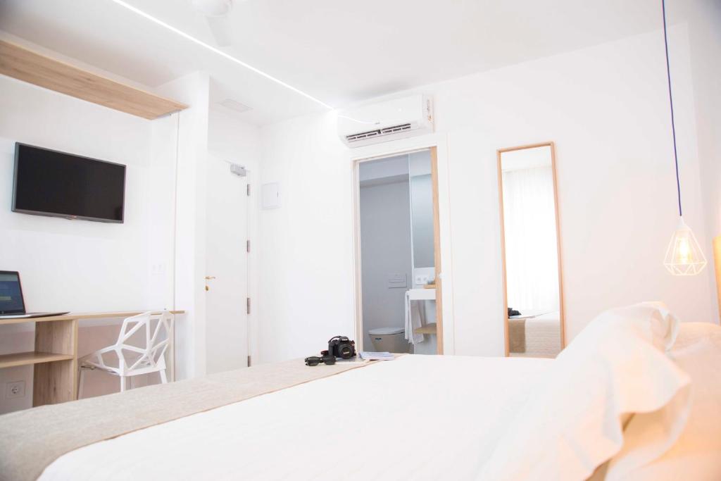Postel nebo postele na pokoji v ubytování Hotel Mar Azul