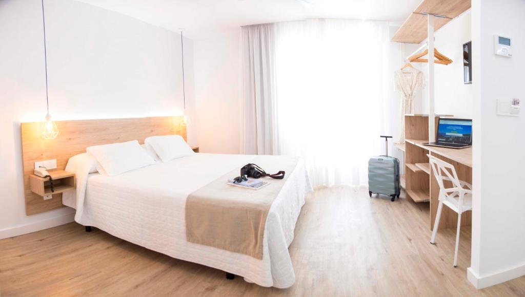 Postel nebo postele na pokoji v ubytování Hotel Mar Azul