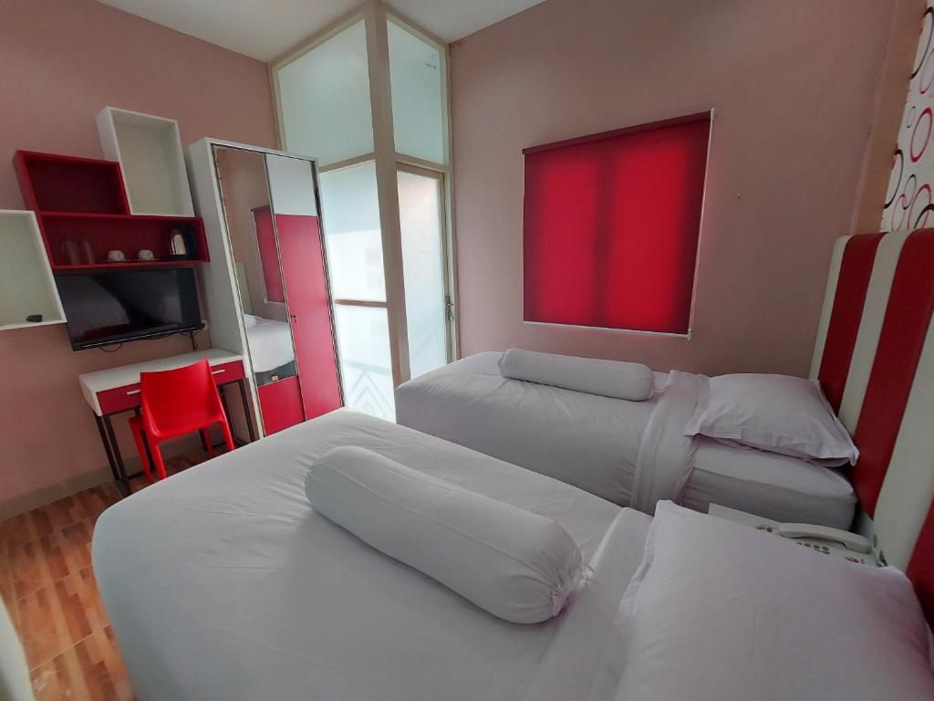 Rumah Familiku 1 Syariah - Deluxe Twin Room