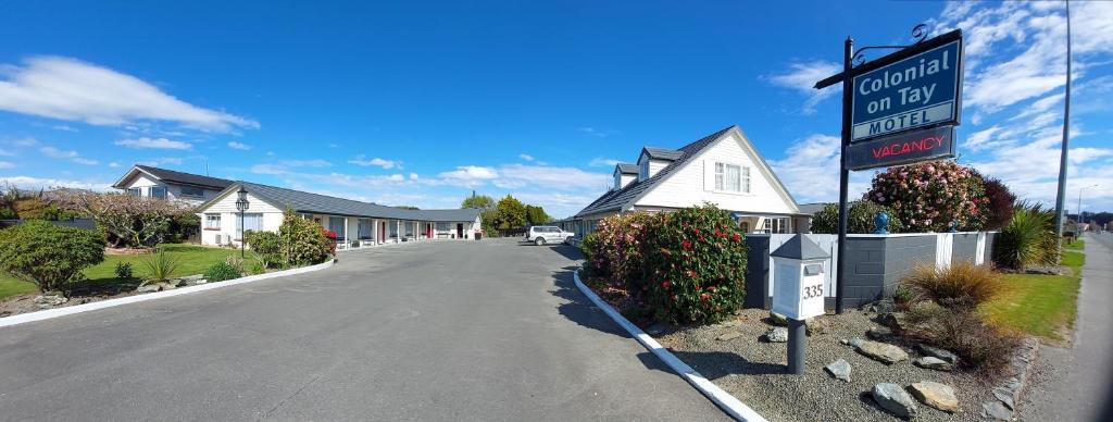 a street sign in front of a house at Colonial on Tay in Invercargill