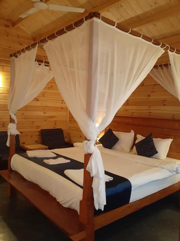 Postel nebo postele na pokoji v ubytování Golden Sands Resort, Morjim