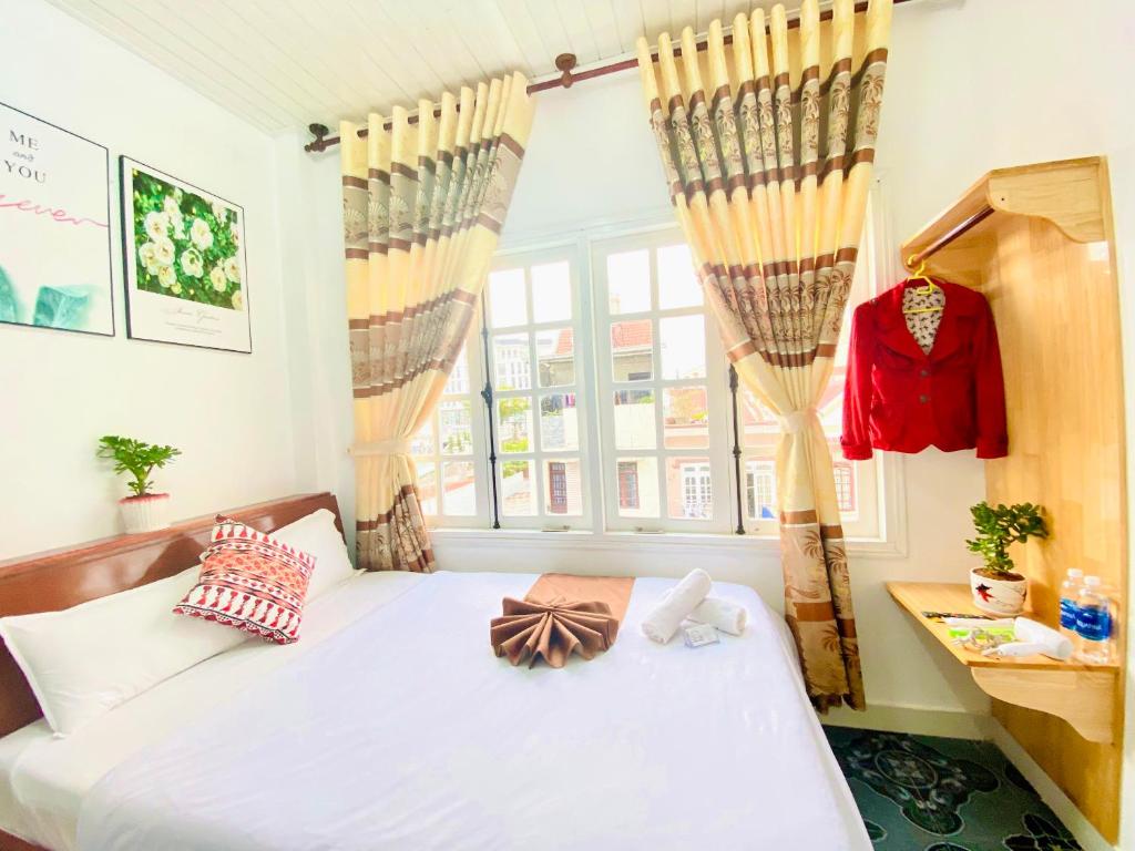 Giường trong phòng chung tại Tam An Homestay