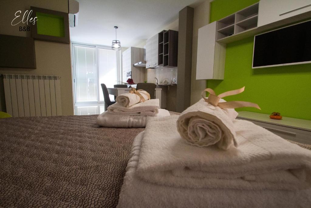 Posteľ alebo postele v izbe v ubytovaní B&B Elles con parcheggio interno