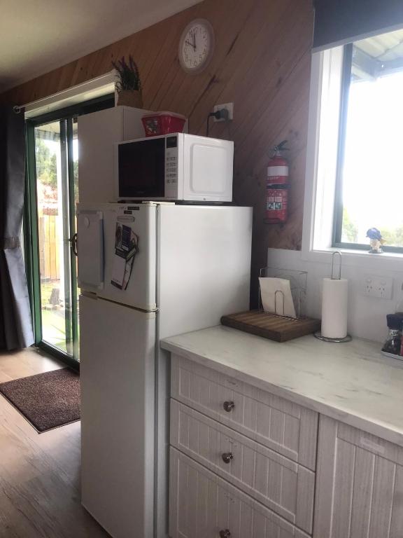 Kuchyň nebo kuchyňský kout v ubytování Winganah Cottage