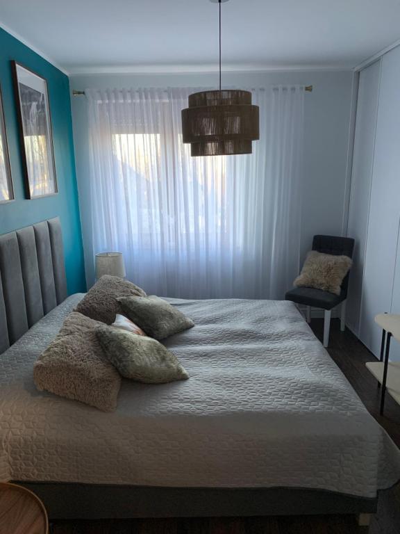 Posteľ alebo postele v izbe v ubytovaní Apartament EverySeason Karpacz