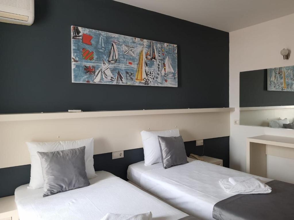 Postel nebo postele na pokoji v ubytování Z OTEL