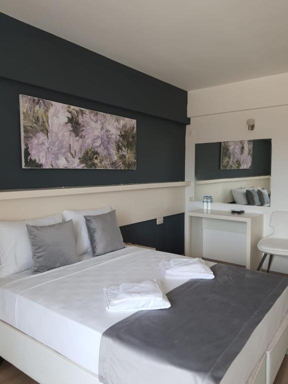 Postel nebo postele na pokoji v ubytování Z OTEL