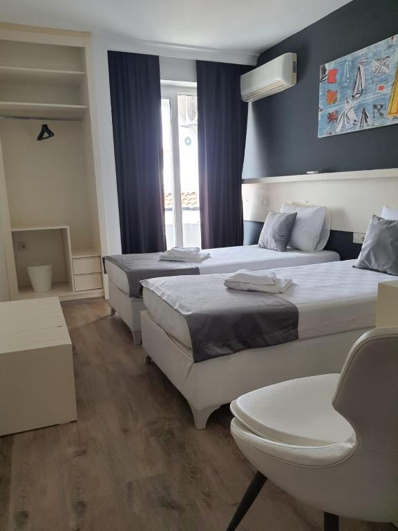 Postel nebo postele na pokoji v ubytování Z OTEL