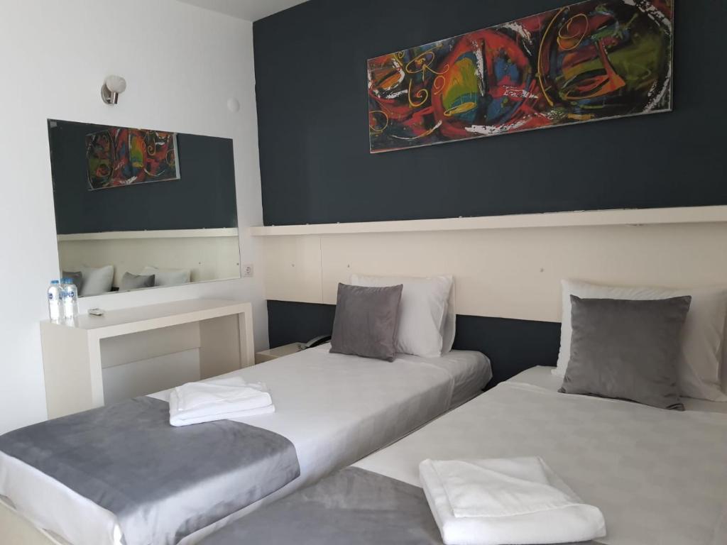 Postel nebo postele na pokoji v ubytování Z OTEL