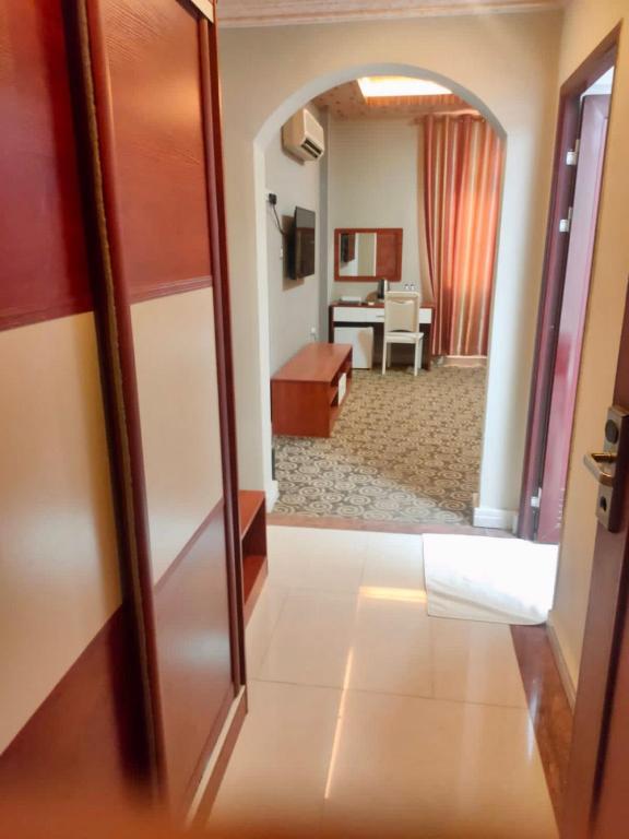 TV a/nebo společenská místnost v ubytování Grand Inn Hotel By Wanasa