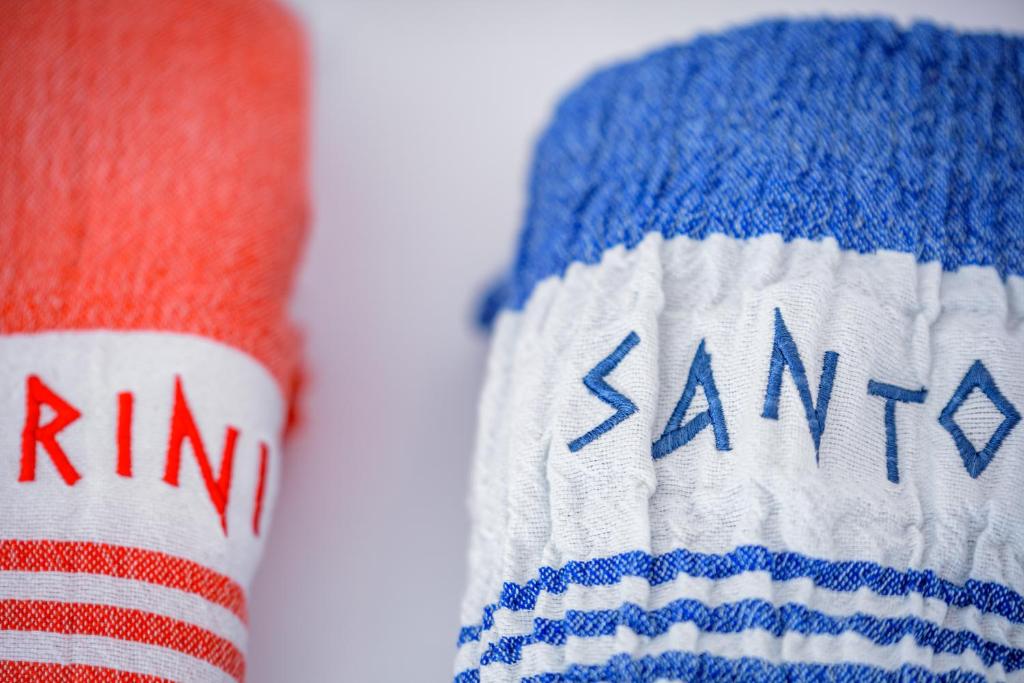 a sock with the american flag and the word santana on it at Aristos Life Luxury Cave Villas in Oia