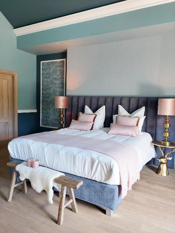 Postel nebo postele na pokoji v ubytování Cha Cha de Loup Luxe B&B - Vakantiewoning