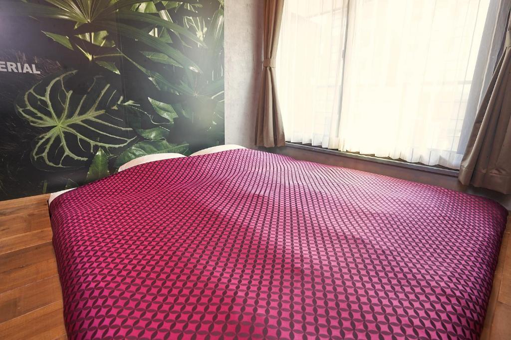 Postel nebo postele na pokoji v ubytování Material