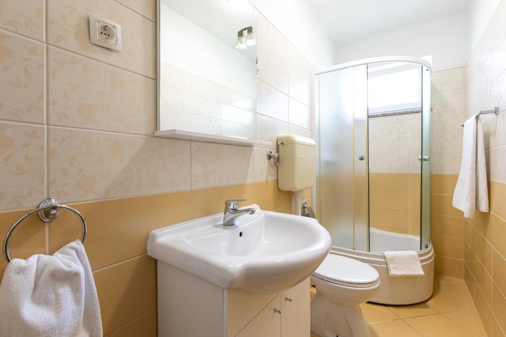 Koupelna v ubytování Apartments Soul