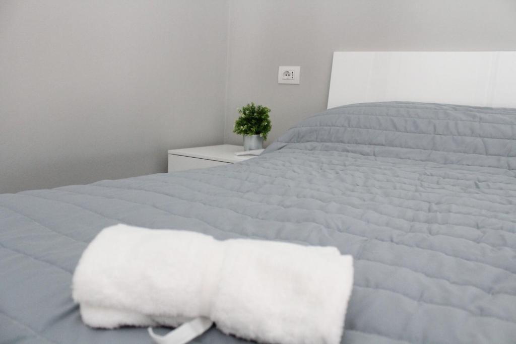Postel nebo postele na pokoji v ubytování Appartamento Cevedale11