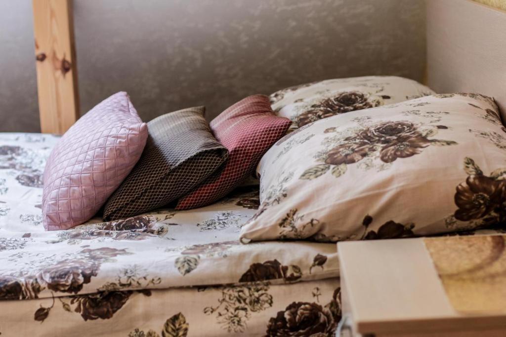 Postel nebo postele na pokoji v ubytování Rotušė
