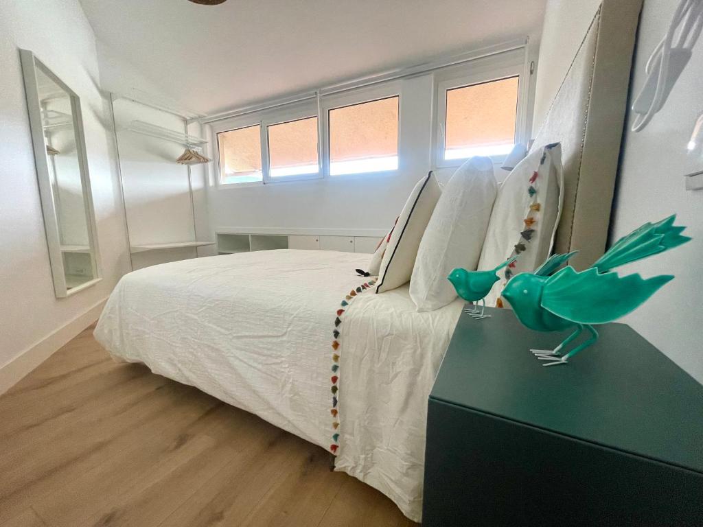 Posteľ alebo postele v izbe v ubytovaní Dania Home Esteiro