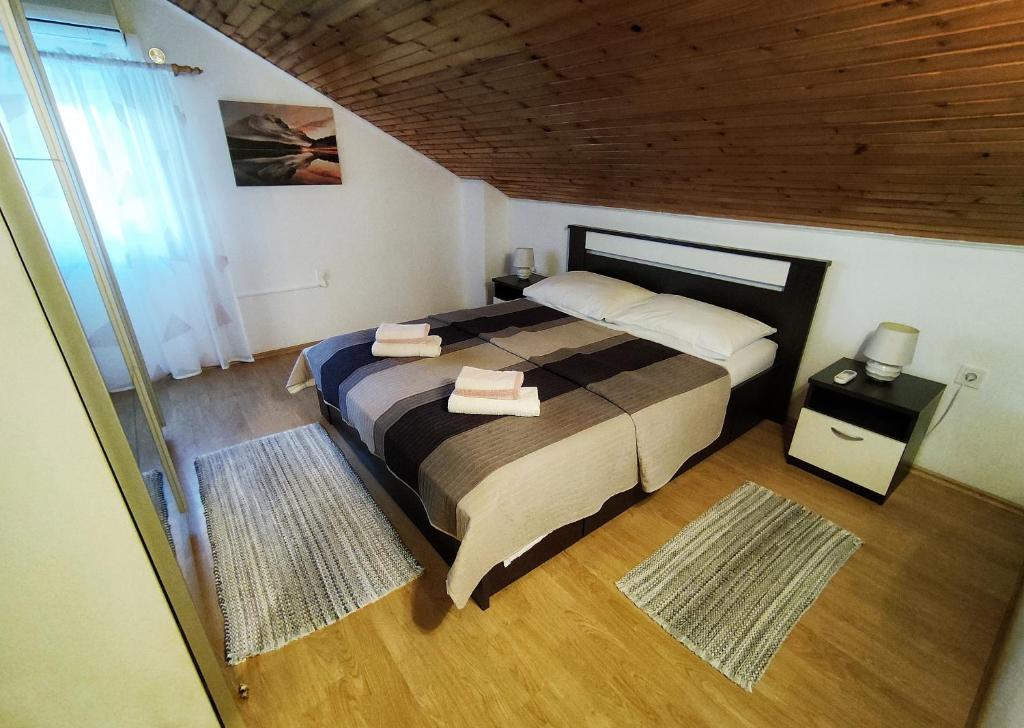 Posteľ alebo postele v izbe v ubytovaní Trsteno Dream House