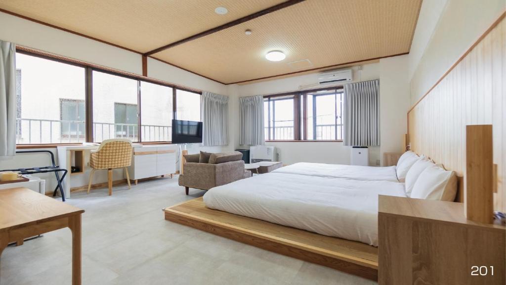 Postel nebo postele na pokoji v ubytování VOYAN Resort Fujiyamanakako Gekkoso