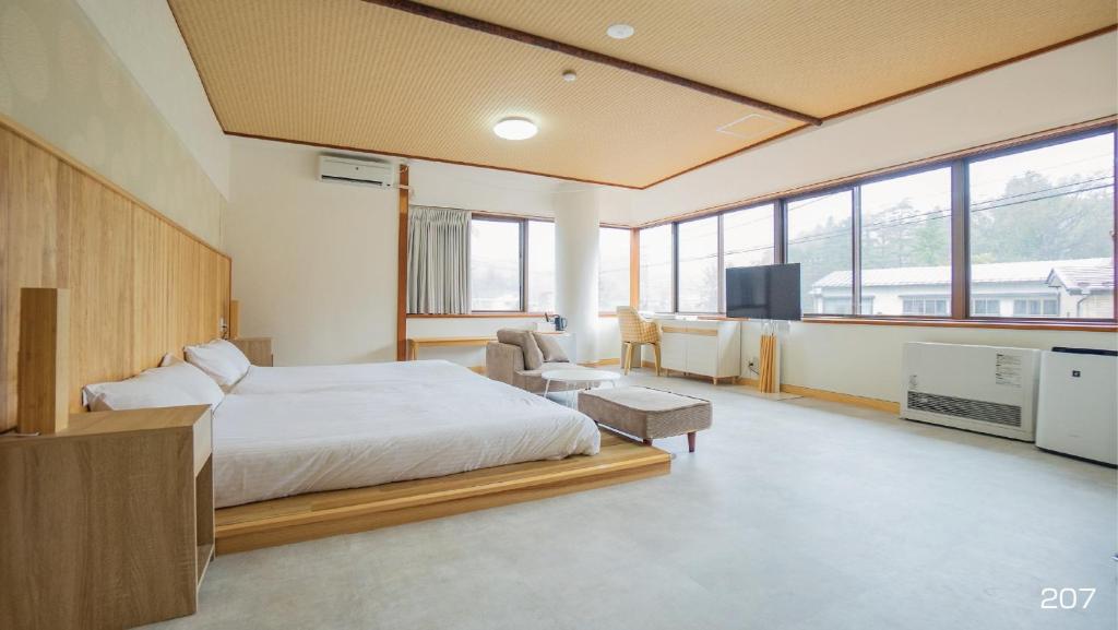Postel nebo postele na pokoji v ubytování VOYAN Resort Fujiyamanakako Gekkoso