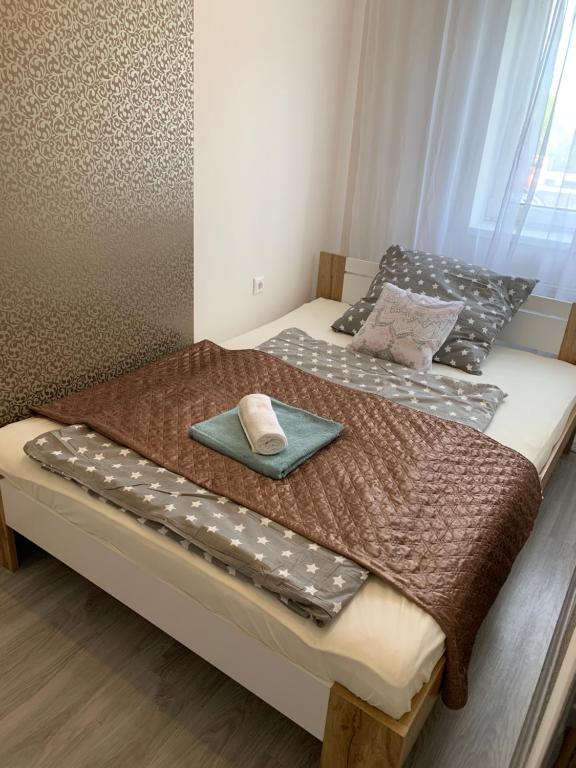 Posteľ alebo postele v izbe v ubytovaní Furó-Lak 2 Apartman Hajdúszoboszló