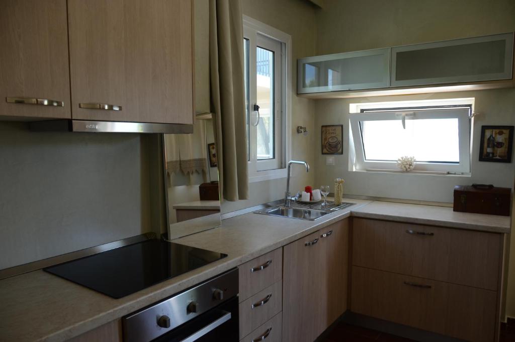 A kitchen or kitchenette at Maison de la mer