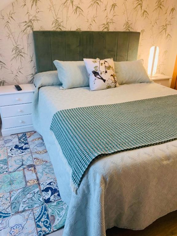 A bed or beds in a room at Apartamento SOFIA